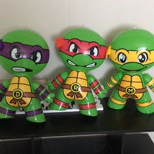 Three blow up Ninja turtles. Mikey, Ralph, Donnie.